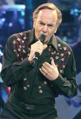 Neil Diamond performs another hit song in concert.