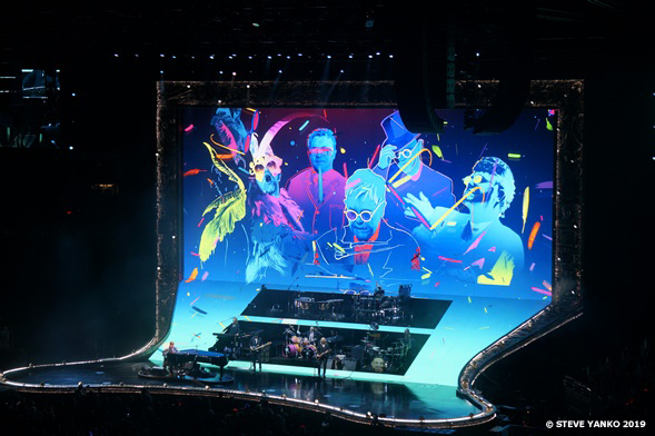 Concert stage. The many faces of Elton John.