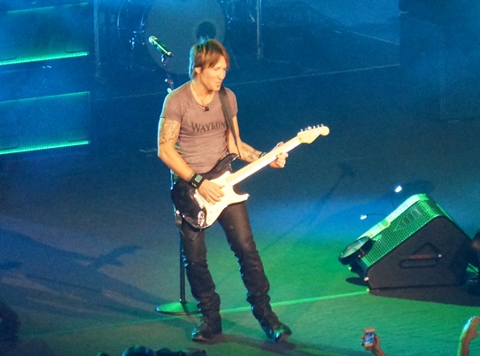 Keith Urban playing another brilliant guitar solo. Photo by Steve Yanko.